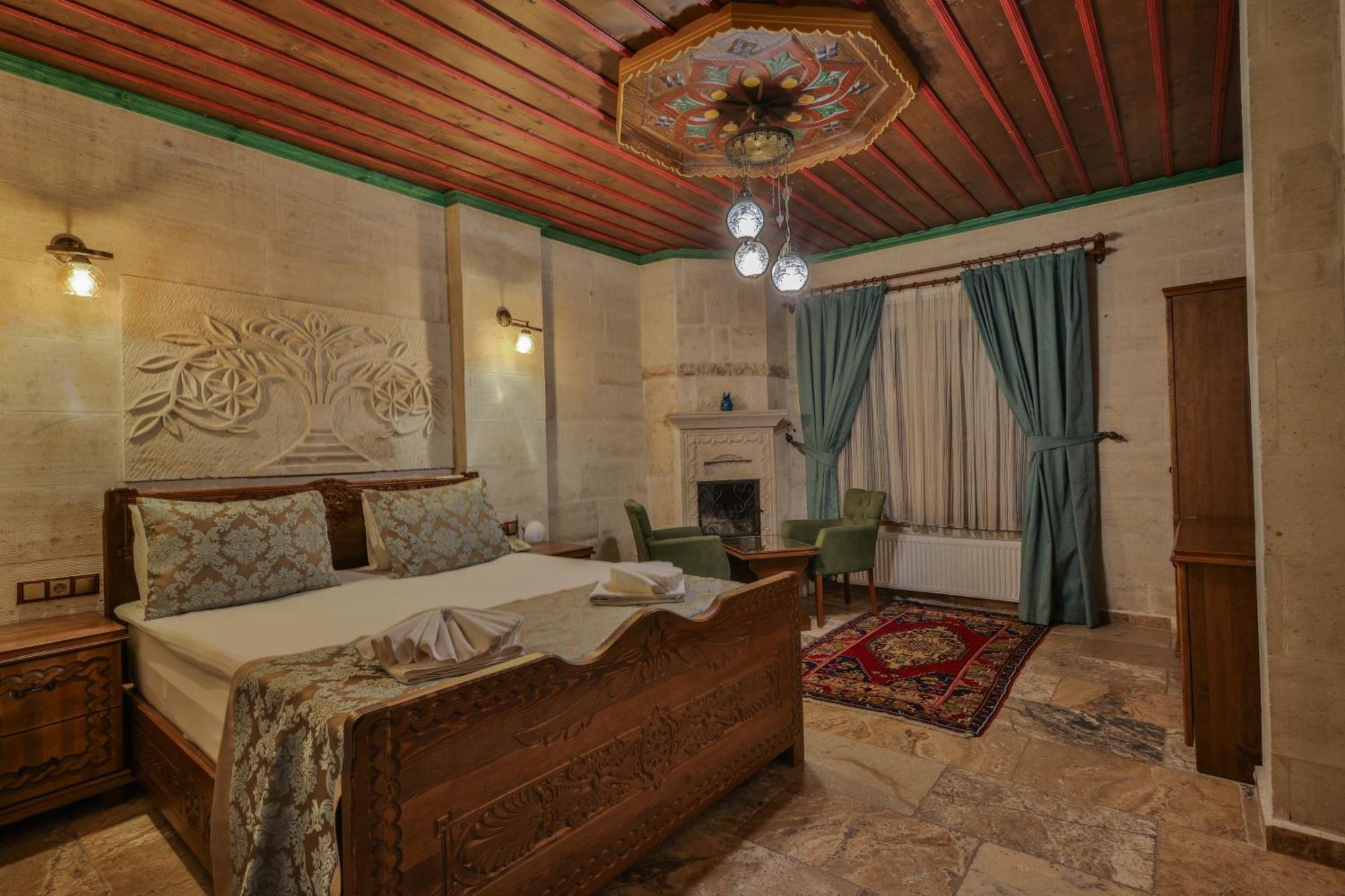 Отель Feel Cappadocia Stone House Гореме Экстерьер фото