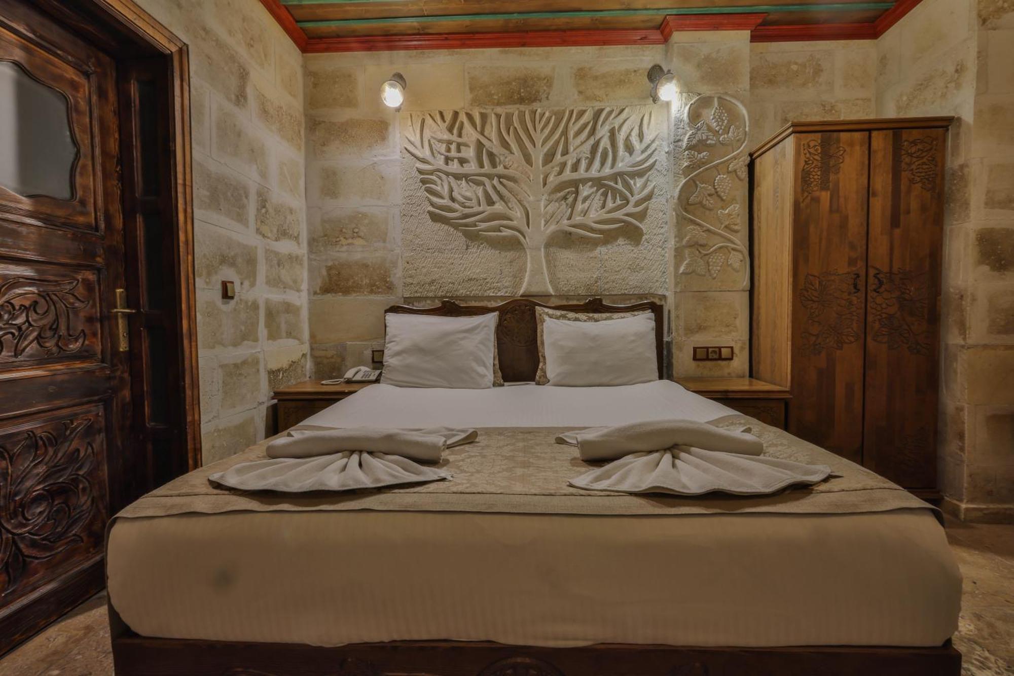 Отель Feel Cappadocia Stone House Гореме Экстерьер фото