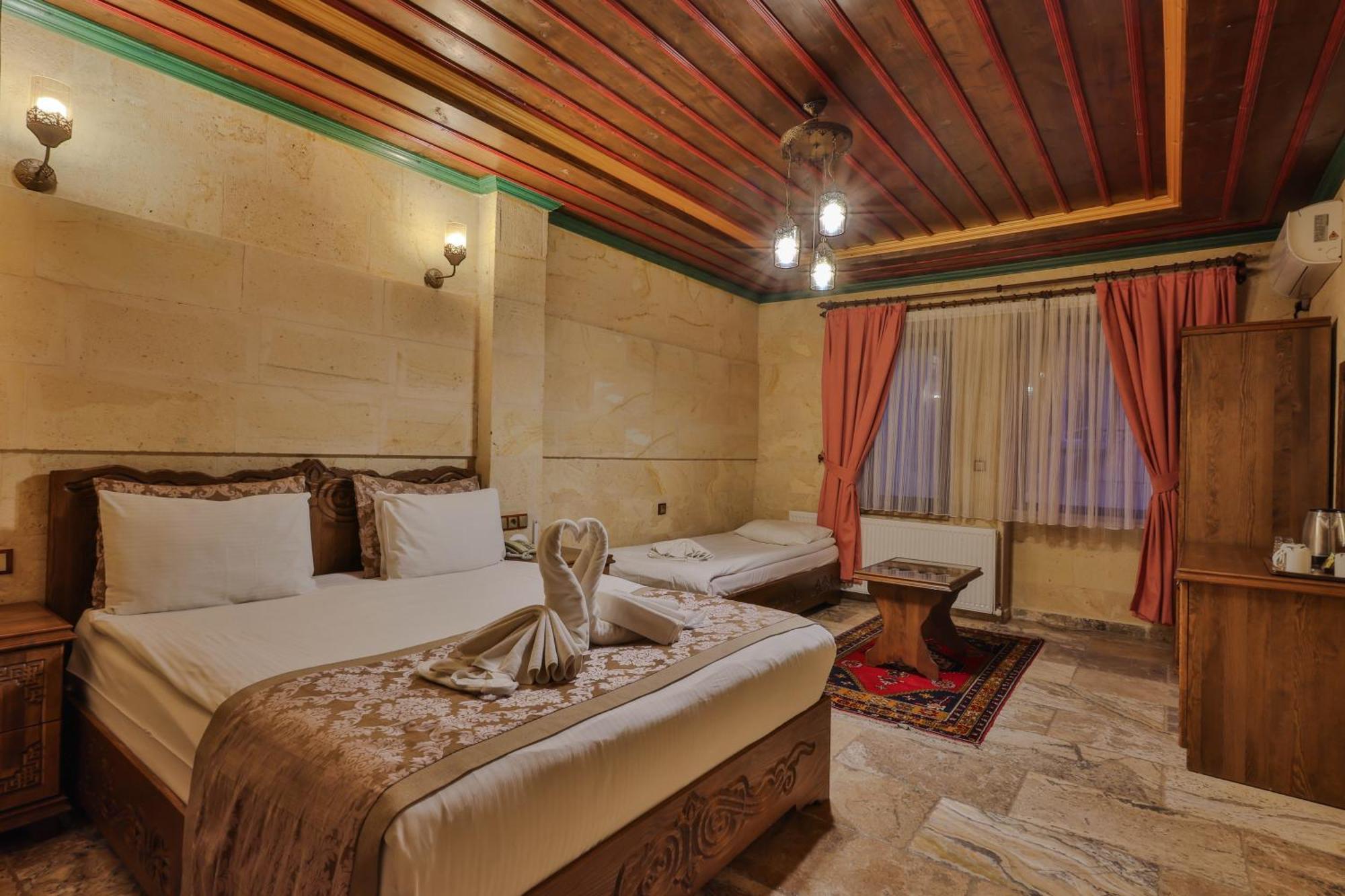 Отель Feel Cappadocia Stone House Гореме Экстерьер фото