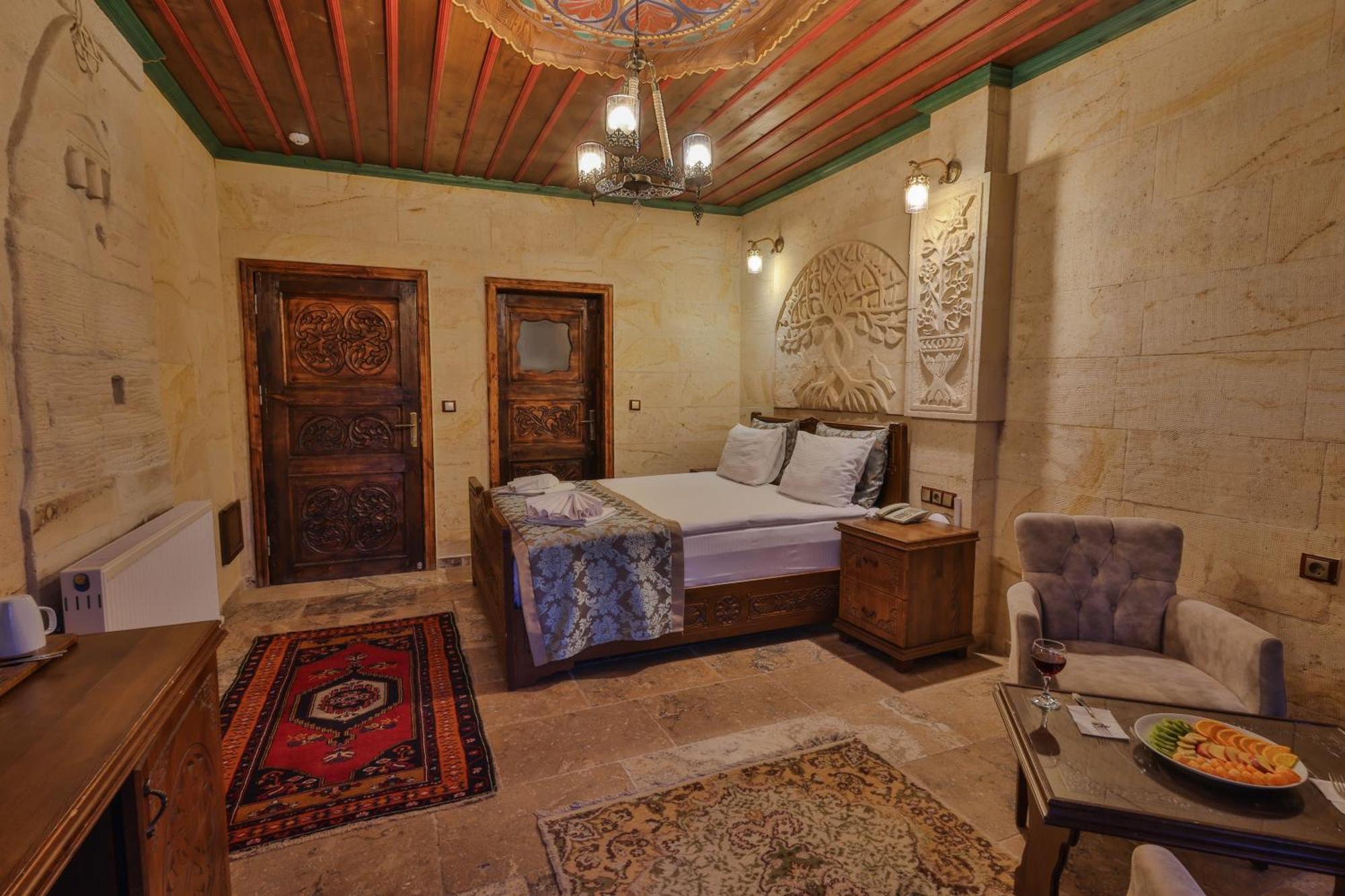 Отель Feel Cappadocia Stone House Гореме Экстерьер фото