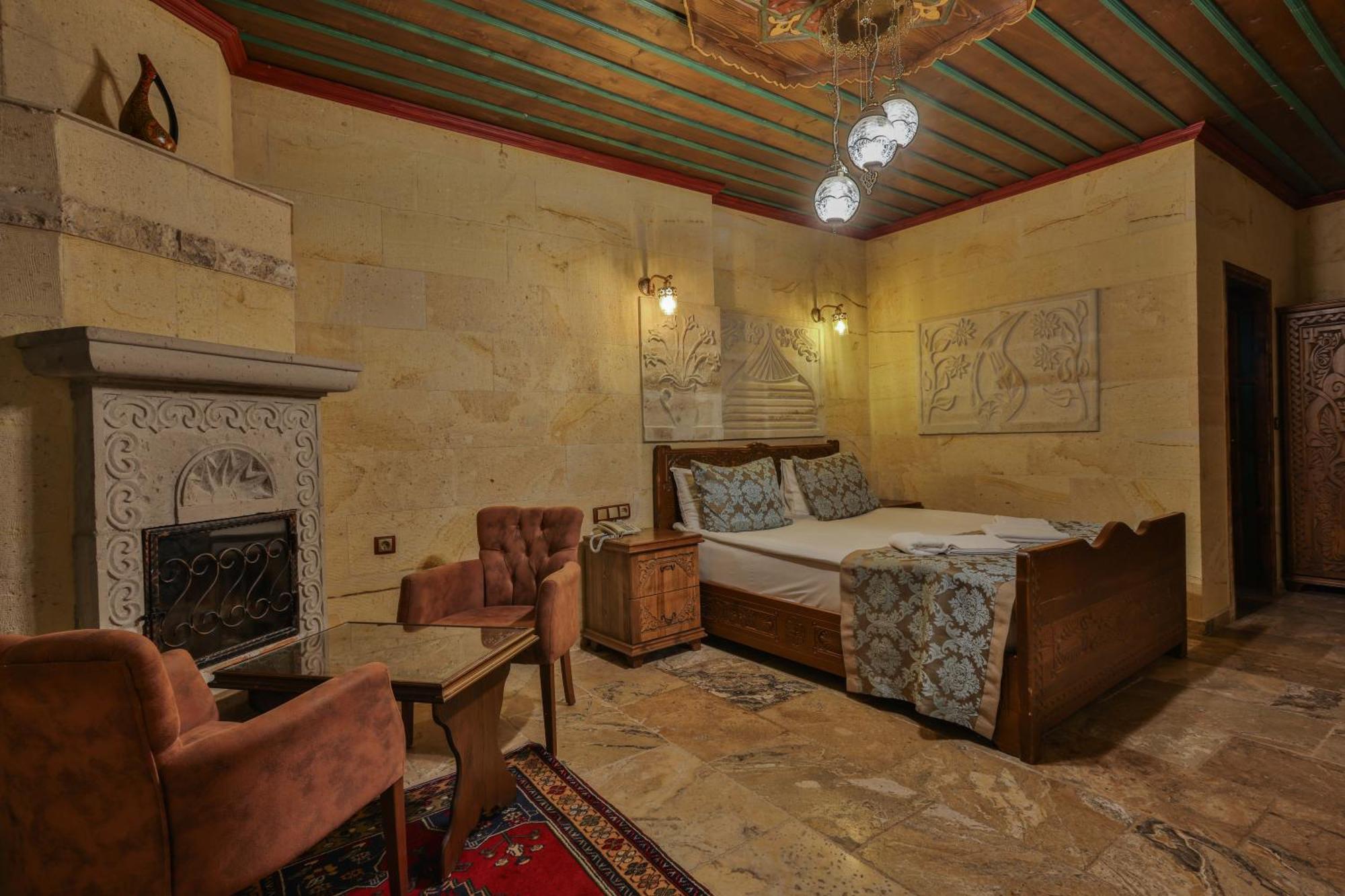 Отель Feel Cappadocia Stone House Гореме Экстерьер фото