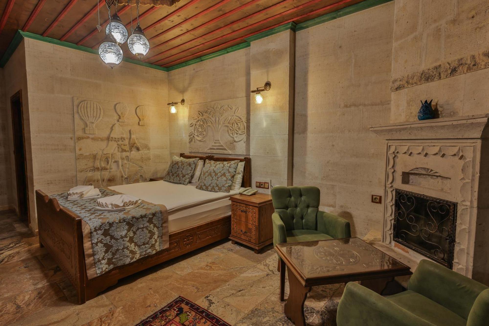 Отель Feel Cappadocia Stone House Гореме Экстерьер фото